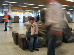 28419 Jenni having a rest in Schiphol Airport.jpg